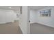 Bright hallway with doors leading to bedrooms at 1414 Vonderay Rd, Orlando, FL 32825