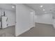 Hallway view of laundry room and bedroom at 1414 Vonderay Rd, Orlando, FL 32825