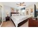 Spacious bedroom with king-size bed and en-suite bathroom at 1455 Rolling Fairway Dr, Davenport, FL 33896