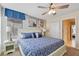 Spacious bedroom with a king-size bed and en-suite bathroom at 1455 Rolling Fairway Dr, Davenport, FL 33896