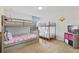 ' bedroom with two sets of bunk beds at 1455 Rolling Fairway Dr, Davenport, FL 33896