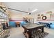 Fun game room with pool table and arcade games at 1455 Rolling Fairway Dr, Davenport, FL 33896