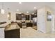 Modern kitchen with stainless steel appliances and granite countertops at 1455 Rolling Fairway Dr, Davenport, FL 33896