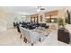 Bright living room featuring comfortable seating, large windows and a modern aesthetic at 1455 Rolling Fairway Dr, Davenport, FL 33896