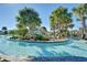 Resort-style pool with a large lazy river at 1455 Rolling Fairway Dr, Davenport, FL 33896