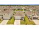 Community of new construction homes with green spaces at 1516 Quinta Rd, Kissimmee, FL 34744