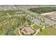 Aerial view of community with homes, park, and parking at 1516 Quinta Rd, Kissimmee, FL 34744