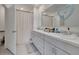 Modern bathroom with double vanity and shower at 1516 Quinta Rd, Kissimmee, FL 34744