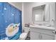 Clean bathroom with a shower/tub combo, vanity, and updated fixtures at 1516 Quinta Rd, Kissimmee, FL 34744