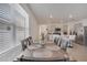 Dining room with table and chairs, adjacent to kitchen at 1516 Quinta Rd, Kissimmee, FL 34744