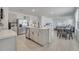Modern kitchen with stainless steel appliances and an island at 1516 Quinta Rd, Kissimmee, FL 34744