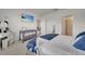 Spacious main bedroom with king bed and adjacent bathroom at 1516 Quinta Rd, Kissimmee, FL 34744