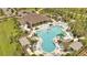 Relaxing resort-style pool with plenty of lounge chairs and shade structures at 1516 Quinta Rd, Kissimmee, FL 34744