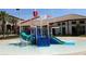 Community splash pad with slides and water features for  at 1560 Flange Dr, Davenport, FL 33896