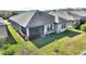 Single-story home with a screened patio and landscaped yard at 217 Montoro Ln, Davenport, FL 33837