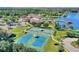 Community tennis courts and lakefront at 217 Montoro Ln, Davenport, FL 33837