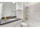 Clean bathroom with a single vanity and tub shower combo at 217 Montoro Ln, Davenport, FL 33837