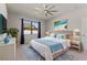 Spacious bedroom with a comfortable bed and calming decor at 217 Montoro Ln, Davenport, FL 33837