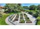 Community garden with individual plots for residents at 217 Montoro Ln, Davenport, FL 33837