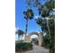 Landscaped path with arched entrance at 217 Montoro Ln, Davenport, FL 33837