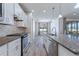 Modern kitchen with stainless steel appliances and an island at 217 Montoro Ln, Davenport, FL 33837