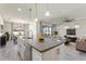 Modern kitchen with granite countertops and stainless steel appliances at 217 Montoro Ln, Davenport, FL 33837
