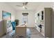 Home office with built-in shelving and comfortable seating at 217 Montoro Ln, Davenport, FL 33837