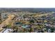 Gorgeous aerial view of the community featuring a golf course, pool and beautiful landscape at 26622 Bull Run, Leesburg, FL 34748
