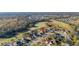 Panoramic aerial view of a residential area near a golf course and natural landscape at 26622 Bull Run, Leesburg, FL 34748