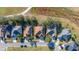 Aerial view showcases a well-placed home near a winding path, bordered by lush greenery, amidst a tranquil neighborhood at 26622 Bull Run, Leesburg, FL 34748