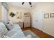 Bright bedroom with hardwood floors, day bed, and large closet at 26622 Bull Run, Leesburg, FL 34748