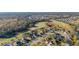 Aerial view of a well-established residential community with lush green spaces, manicured landscaping at 26622 Bull Run, Leesburg, FL 34748