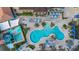 Resort-style pool with water slide and sundeck at 2713 Roadster Ln, Kissimmee, FL 34746