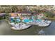 Community pool and clubhouse with lake access at 2713 Roadster Ln, Kissimmee, FL 34746