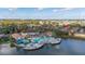 Community features a resort-style pool, lake, and lush landscaping at 2713 Roadster Ln, Kissimmee, FL 34746