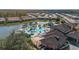 Resort-style pool and clubhouse with lake views at 2713 Roadster Ln, Kissimmee, FL 34746