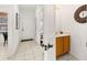 Clean bathroom with wood vanity and tiled floors at 2713 Roadster Ln, Kissimmee, FL 34746