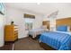 Bedroom with two twin beds and ample closet space at 2713 Roadster Ln, Kissimmee, FL 34746