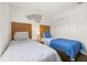 Bedroom with two twin beds and shared closet at 2713 Roadster Ln, Kissimmee, FL 34746