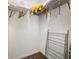 Walk-in closet with shelving and hanging rods at 2713 Roadster Ln, Kissimmee, FL 34746