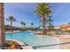 Inviting pool with water features and palm trees at 2713 Roadster Ln, Kissimmee, FL 34746