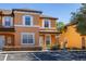 Two-story townhome with parking in front at 2713 Roadster Ln, Kissimmee, FL 34746