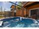 Soak in this bubbly hot tub under the Florida sun at 2713 Roadster Ln, Kissimmee, FL 34746