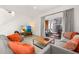 Relaxing living room, flat-screen TV and patio access at 2713 Roadster Ln, Kissimmee, FL 34746