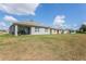 View of home's backyard and neighboring homes at 362 Alexzander Way, Winter Haven, FL 33881