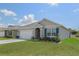 Newly built one-story house with a two-car garage at 362 Alexzander Way, Winter Haven, FL 33881