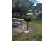 Picnic table and grill in a grassy area at 3984 Atrium Dr # 4, Orlando, FL 32822