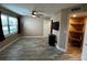 Neutral bedroom with light wood-look flooring, a large window, and a custom closet at 3984 Atrium Dr # 4, Orlando, FL 32822