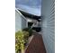 Exterior pathway and stairs between light-blue buildings at 3984 Atrium Dr # 4, Orlando, FL 32822