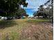 Community courtyard with trees, grass, and a picnic table at 3984 Atrium Dr # 4, Orlando, FL 32822